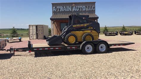 properly securi g a skid steer to a trailer|skid steer trailer loading instructions.